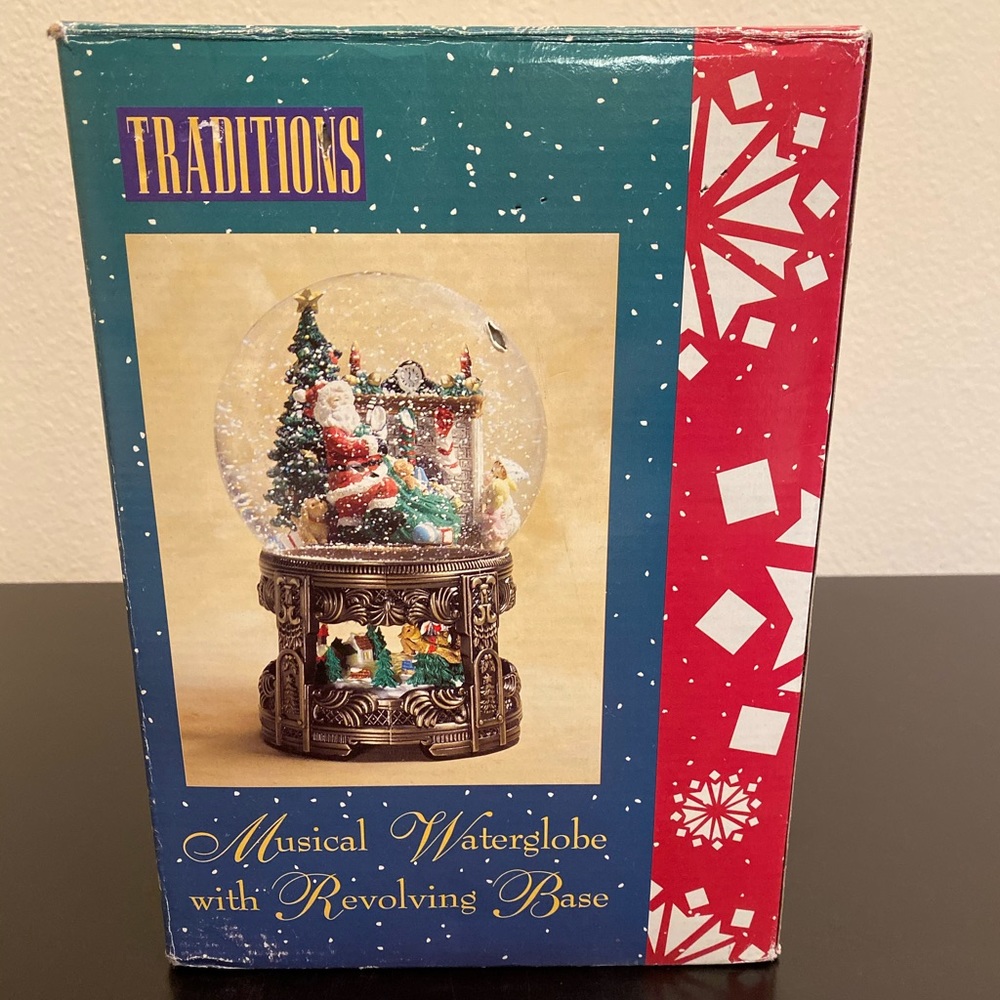 Traditions musical water globe with revolving base